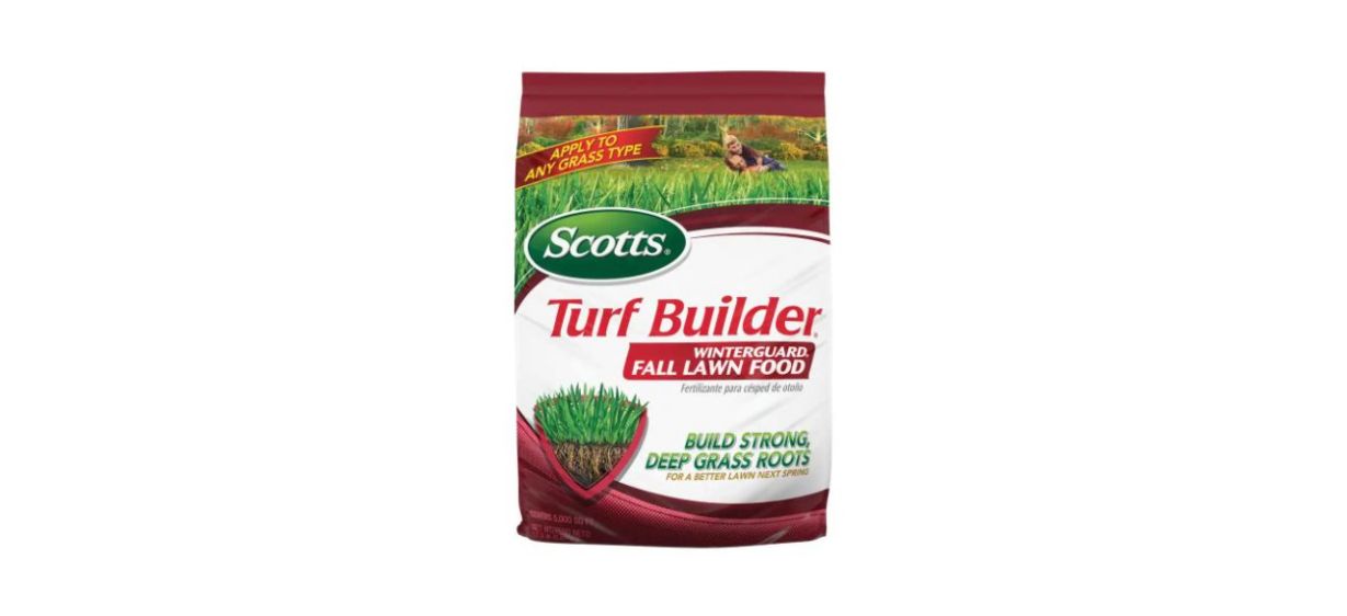 A white and red bag of fall lawn turf builder granules. Text says&quot; build strong, deep grass roots&quot; 