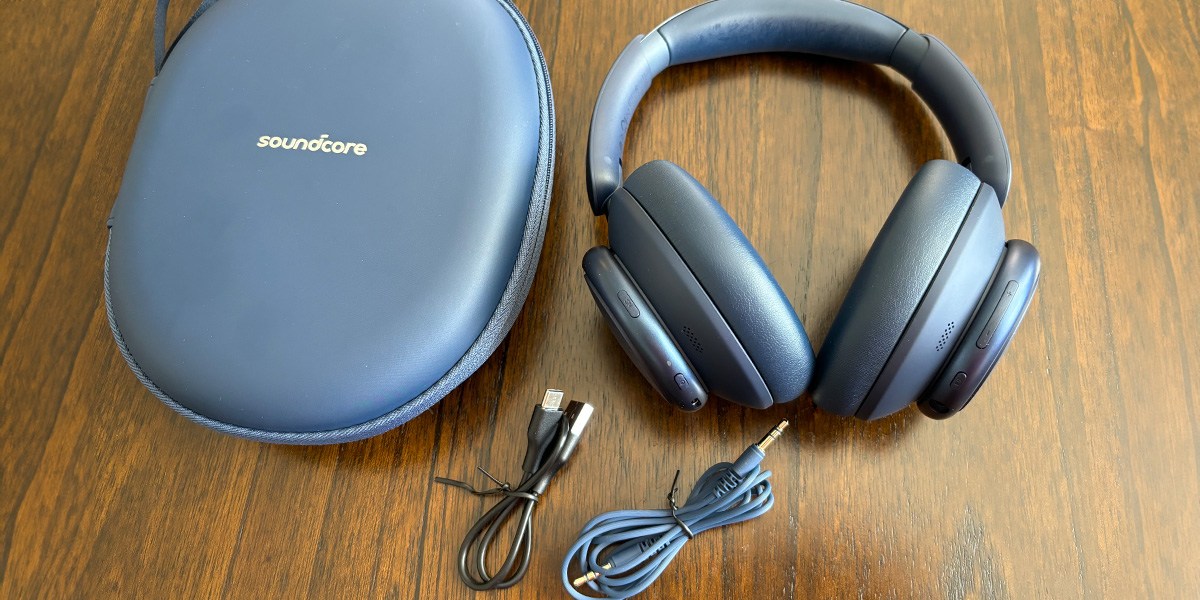 Soundcore Space Q45 on table next to carrying case  Soundcore Space Q45 on table next to carrying case