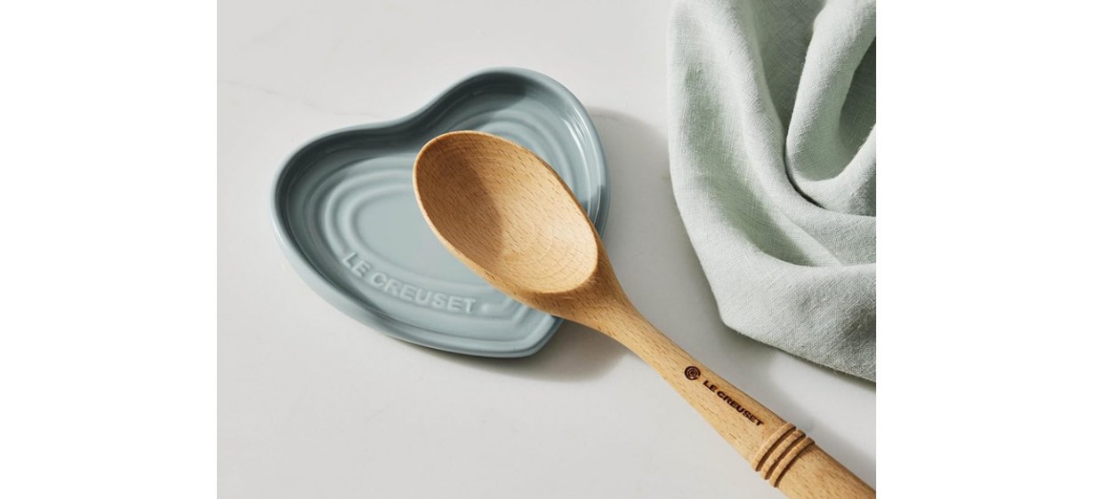Spooon resting on sage Le Creuset Stoneware Heart Shaped Spoon Rest, Shallot