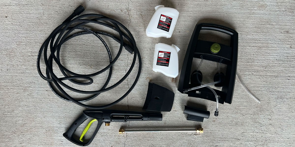 Sun Joe SPX3000 accessories displayed on driveway Sun Joe SPX3000 accessories displayed on driveway