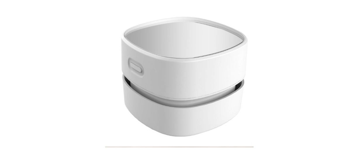 a square, small desktop vacuum cleaner with rounded edges a square, small desktop vacuum cleaner with rounded edges