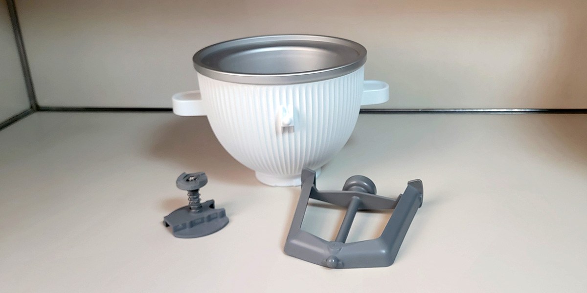 KitchenAid Ice Cream Maker bowl and parts on kitchen counter KitchenAid Ice Cream Maker bowl and parts on kitchen counter