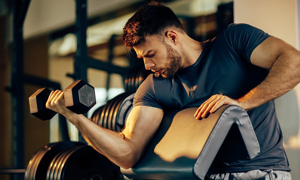 Handsome man Sport Dumbbells