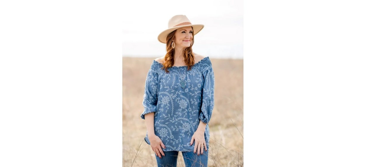 Woman wearing The Pioneer Woman Boho Fedora Hat outdoors