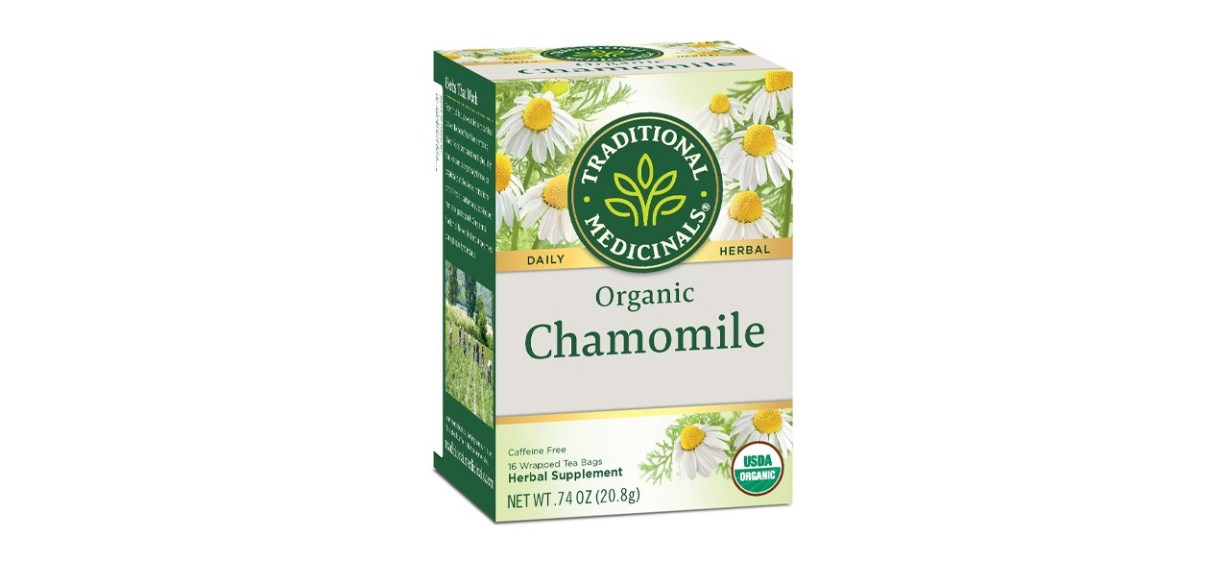 A box of tea bags. It's green and white with daisy-looking flowers on it. Text reads: &quot;Traditional Medicinals Daily Herbal Organic Chamomile. Caffeine Free. 16 wrapped tea bags. Herbal supplement.&quot;