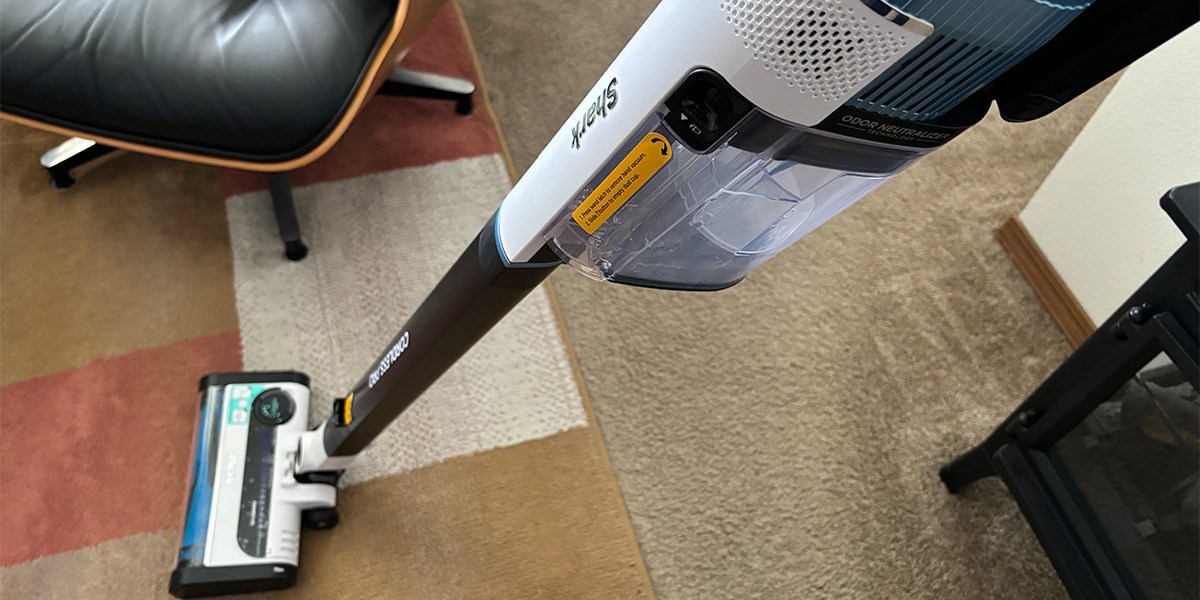 Shark Cordless Pro Vacuum on color-block area rug