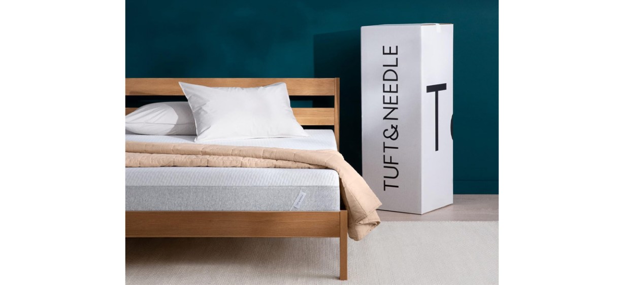 Tuft &amp; Needle Original Queen Mattress in bedroom next to product box