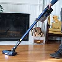Cordless vacuum on wood floor